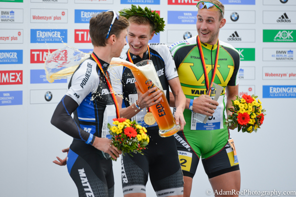Bart Swings, Winner of the Inline Skating Marathon, pours beer on the silver medalist, his brother.