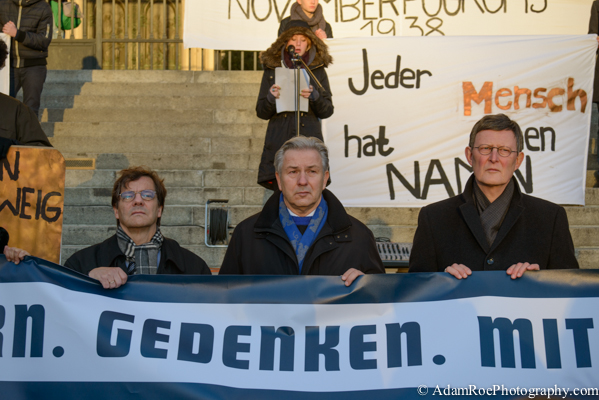 The Mayor (center) and Bishops in front of the Berliner Dom (Berlin Cathedral) while students read aloud stories of lives destroyed on Kristallnacht.