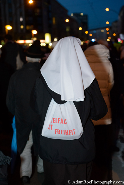 A nun who marched wearing her habit and a bag which reads "Vielfalt ist Freiheit" - Diversity is Freedom.