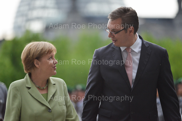 Angela Merkel and Aleksandar Vucic have chat at the reception.