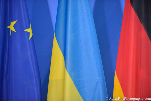 The flag of the Ukraine neatly sandwiched in between the European flag and the German Flag.