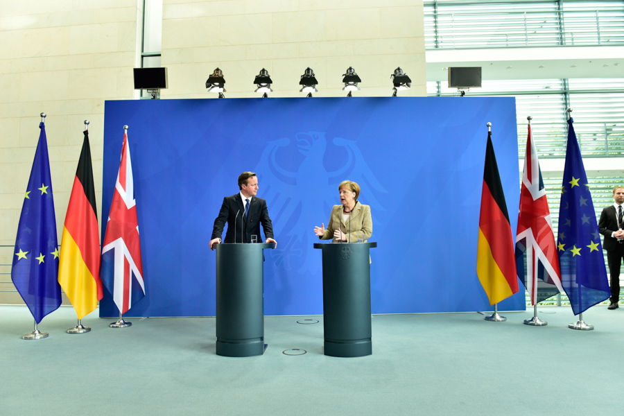 Angela Merkel and David Cameron chatting amongst the Union Jack, the German  flag and yes, the EU's stars. 