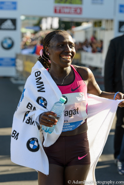 Florence Kiplagat, Women's winner of the Berlin Marathon, after crossing the finish line