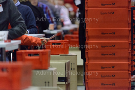 A vote of a party member is counted by an SPD volunteer in a hall in Berlin, deciding on a Great Coalition