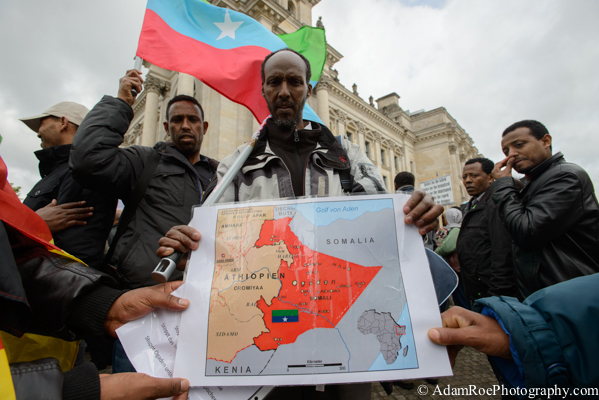 A protestor holds up a map of Oromia and its sorrounding region.