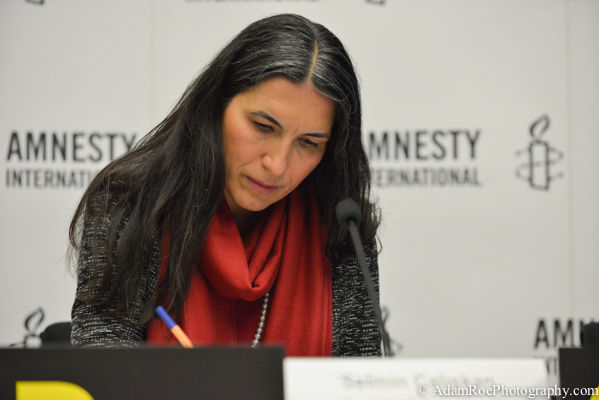 Selmin Caliskan, the Director of German Chapter of Amnesty International, prepares for the press conference.