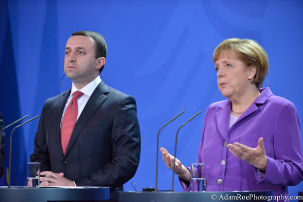 Angela Merkel speaks while Irakli Garibashvili, the Prime Minister of Georgia, listens. 